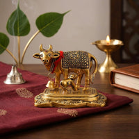 Decorative Metal Cow & Calf Idol – Kamdhenu Statue for Pooja Room, Home Décor & Office Desk | Vastu Showpiece for Diwali & Housewarming Gifting (Golden / Silver)